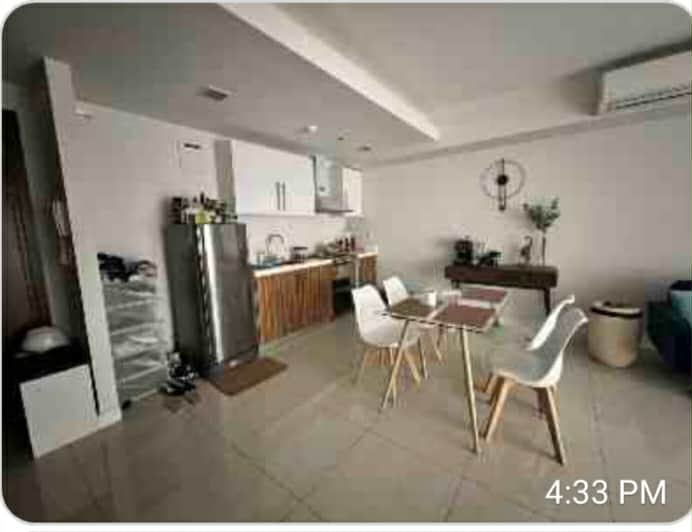 1BR with Balcony In Alcoves Condominium