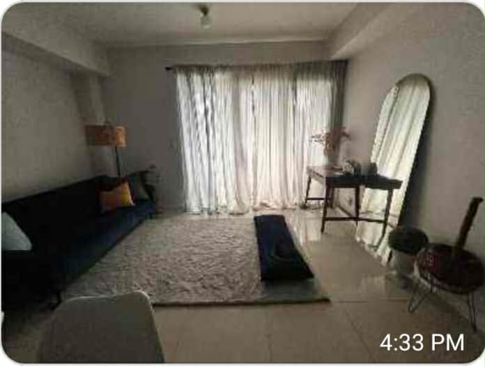 1BR with Balcony In Alcoves Condominium